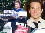 UK CLIENTS MUST CREDIT: AKM-GSI ONLY\nEXCLUSIVE: Malibu, CA - 'Joy' star Bradley Cooper carries a bunch of Christmas gifts and a few bags as his friend stops by his place on this Monday afternoon. Dressing down, the scruffy actor wore a navy blue hoodie with matching trousers and brown leather shoes.\n\nPictured: Bradley Cooper\nRef: SPL1201673  291215   EXCLUSIVE\nPicture by: AKM-GSI / Splash News\n\n