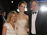 HOLLYWOOD, CA - FEBRUARY 24:  Jennifer Lawrence, winner of Best Actress for her role in 'Silver Linings Playbook' and her parents Karen Lawrence and Gary Lawrence attend the Oscars Governors Ball at Hollywood & Highland Center on February 24, 2013 in Hollywood, California.  (Photo by Kevork Djansezian/Getty Images)