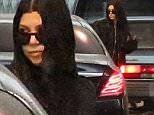 Kourtney Kardashian braves the rain for brunch by herself at Boa in West Hollywood  Tuesday January 5, 2015. X17online.com