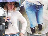 Picture Shows: Hilary Duff  January 05, 2016\n \n Actress Hilary Duff braves the rain to get a cup of coffee in Los Angeles. Hilary took a selfie of her boots, ankle-deep in a puddle before going inside.\n \n EXCLUSIVE All Rounder\n UK RIGHTS ONLY\n Pictures by : FameFlynet UK © 2016\n Tel : +44 (0)20 3551 5049\n Email : info@fameflynet.uk.com
