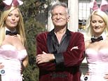HOLMBY HILLS, CA - MAY 6:  (L to R) Playboy bunny Sheila Levell, Playboy founder Hugh Hefner and Playboy bunny Holly Madison perform a scene during the filming of a commercial for "X Games IX" at the Playboy Mansion May 6, 2003 in Holmby Hills, California. This year's X Games will take place at STAPLES Center in Los Angeles from August 14th through 18th.  (Photo by Robert Mora/Getty Images) 
Playboy mansion for sale