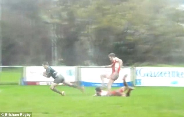 The outside centre goes for a stylish sliding finish for his 'try' in the National League 3 South West clash