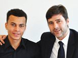 ENFIELD,UNITED KINGDOM - JANUARY 12: Dele Alli of  Tottenham Hotspur FC poses with Manager Mauricio Pochettino after signing a new contract at the Tottenham Hotspur Training Ground on January 12, 2016 in Enfield, England. (Photo by Tottenham Hotspur FC via Getty Images)