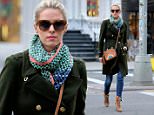 TV personality Nicky Hilton, wearing a rainbow purse, lace-up ankle boots, jeans, colorful scarf and dark green wool jacket, Rothschild walks to Soho in New York City on January 20, 2016.\n\nPictured: Nicky Hilton Rothschild\nRef: SPL1212179  200116  \nPicture by: Christopher Peterson/Splash News\n\nSplash News and Pictures\nLos Angeles: 310-821-2666\nNew York: 212-619-2666\nLondon: 870-934-2666\nphotodesk@splashnews.com\n