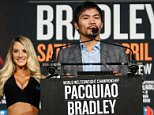 Boxers Manny PacquiaoC(C) and Timothy Bradley(R) attend a press conference at Madison Square Garden in New York on January 21, 2015, to announce their 12-round welterweight championship fight on April 9 in Las Vegas. / AFP / KENA BETANCURKENA BETANCUR/AFP/Getty Images