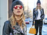 Karlie Kloss steps out in the New York snow wearing a flower-patterned leather jacket\n\nPictured: Karlie Kloss\nRef: SPL1216284  270116  \nPicture by:  Splash News\n\nSplash News and Pictures\nLos Angeles: 310-821-2666\nNew York: 212-619-2666\nLondon: 870-934-2666\nphotodesk@splashnews.com\n