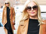 EXCLUSIVE: Kate Bosworth spotted wearing Cat Eye Sunglasses and camel coat while out and about in New York City, after she takes a trip to Barney's New York on Madison Avenue\n\nPictured: Kate Bosworth\nRef: SPL1217862  290116   EXCLUSIVE\nPicture by: Felipe Ramales / Splash News\n\nSplash News and Pictures\nLos Angeles: 310-821-2666\nNew York: 212-619-2666\nLondon: 870-934-2666\nphotodesk@splashnews.com\n