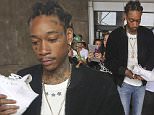 EXCLUSIVE: Wiz Khalifa was asked about the twitter feud with Kanye West and Amber Rose, as he arrived in Santiago, Chile for a concert. The Rapper was being mobbed by a large crowd of teenagers as he arrived to perform a concert. As he entered into the SUV, he shows off his 'stylish pants' as complimented by Kanye. \n\nPictured: wiz khalifa\nRef: SPL1217127  280116   EXCLUSIVE\nPicture by: Splash News\n\nSplash News and Pictures\nLos Angeles: 310-821-2666\nNew York: 212-619-2666\nLondon: 870-934-2666\nphotodesk@splashnews.com\n