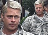 **USA ONLY** Paris, France - Brad Pitt is spotted on set of his new movie 'War Machine' at the Grand Hotel in Paris. The 52-year-old actor is in character wearing camo gear to film a scene.