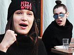 EXCLUSIVE TO INF.\nJanuary 31, 2016: Bella Hadid seen having lunch with friends. During the meal she can be seen making funny faces at her male companion, New York City.\nMandatory Credit: INFphoto.com Ref.: infusny-198/204