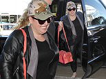 Rebel Wilson is all smiles as she's  spotted in leather pants and a leather jacket with an army truckers cap.  The adorable Australian actress/comedian was seen flying out of LAX\n\nPictured: Rebel Wilson\nRef: SPL1219084  010216  \nPicture by: Sharky / Splash News\n\nSplash News and Pictures\nLos Angeles: 310-821-2666\nNew York: 212-619-2666\nLondon: 870-934-2666\nphotodesk@splashnews.com\n