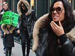 EXCLUSIVE: Padma Lakshmi with a friend and her daughter Krishna Thea Lakshmi-Dell with a banner seen in New York February 1, 2016\n\nPictured: Padma Lakshmi, Krishna Thea Lakshmi-Dell\nRef: SPL1217077  010216   EXCLUSIVE\nPicture by: NIGNY / Splash News\n\nSplash News and Pictures\nLos Angeles: 310-821-2666\nNew York: 212-619-2666\nLondon: 870-934-2666\nphotodesk@splashnews.com\n