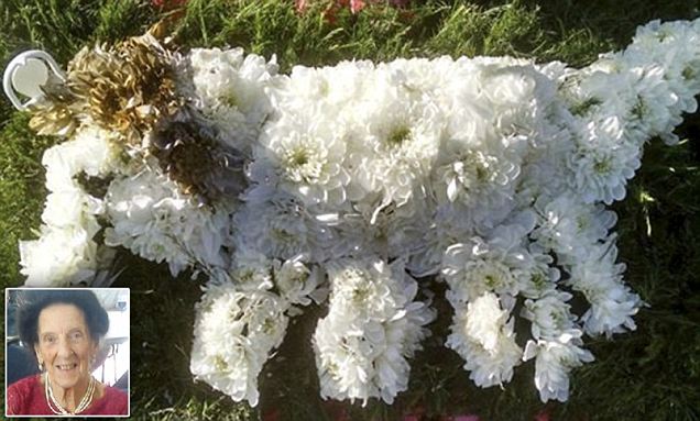 Man is stunned with his 'Jack Russell' floral tribute for widow's funeral