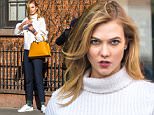EXCLUSIVE: Karlie Kloss looks casual chic and carries fierce Louis Vuitton orange bag during a photo shoot in West Village in New York City.\n\nPictured: Karlie Kloss\nRef: SPL1221298  060216   EXCLUSIVE\nPicture by: Allan Bregg/Splash News\n\nSplash News and Pictures\nLos Angeles: 310-821-2666\nNew York: 212-619-2666\nLondon: 870-934-2666\nphotodesk@splashnews.com\n