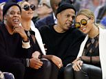 Alamy Live News. FEG4DN Oakland, Calif, USA. 6th Feb, 2016. Jay Z and Beyonce attend the Golden State Warriors game against the Oklahoma City Thunder on Saturday, Feb. 6, 2016, at Oracle Arena in Oakland, Calif. © Anda Chu/Bay Area News Group/TNS/Alamy Live News This is an Alamy Live News image and may not be part of your current Alamy deal . If you are unsure, please contact our sales team to check.