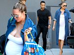 147774, EXCLUSIVE: Chrissy Teigen displays her large baby bump in a tight white dress as she arrives at a Super Bowl party with husband John Legend. Model, foodie and cookbook author Chrissy looked effortlessly chic in a long tight white dress accentuating her bump, a long denim shirt, heels and her hair in a top knot. The famous couple were seen carrying grocery bags from different stores including Whole Foods, Bristol Farms, Sur La Table and home delivery service Instacart as they arrived at a friends house with her mother Vilailuck, ahead of this afternoonís Super Bowl. Los Angeles, California - Sunday February 7, 2016. Photograph: © PacificCoastNews. Los Angeles Office: +1 310.822.0419 sales@pacificcoastnews.com FEE MUST BE AGREED PRIOR TO USAGE