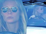 Gwyneth Paltrow drives away in her white Range Rover after attending longtime pal and Iron Man co-star Robert Downey Jr.'s party in Malibu, CA. X17online.com February 6, 2016.