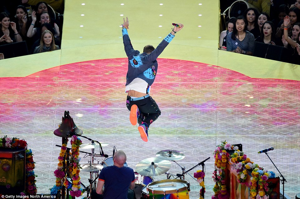 Flying high: Chris got some serious air as he jumped around on stage