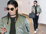 EXCLUSIVE TO INF.\nFebruary 08, 2016: Lily Aldridge and sister Ruby Aldridge greet each other with a long, warm hug as they are spotted jetting out of New York City from JFK airport.\nMandatory Credit: PapJuice/INFphoto.com Ref: infusny-285