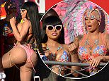Amber Rose and Blac Chyna give carnival goers an eyeful as they party at Trinidad Carnival. See SWNS story SWCARNIVAL. The pair who are both known for flashing their flesh were dressed in appropriately racy carnival attire.