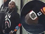 Floyd Mayweather goes shopping on Mount Street in London's Mayfair Christian louboutin store with an entourage of around 6men with 3 people carrier Mercedes parked up outside. 
Also had 3 women with him, Valentine's Day shopping? Left the store with multiple bags. He is reportedley wearing a £400k watch 
He was in there a while, the store wouldn't let anyone else in whilst he was inside.