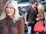 Los Angeles, CA - Tori Spelling heads to a meeting dressed in throwback look. She is wearing camel flares with platform heels and a polka dot blouse. To complete the 70s look, Tori carries a tassel cross body bag. The 42-year-old actress recently appeared on 'Kocktails with Khloe' where she revealed her alter-ego 'Terri.' Tori explains, ìWhen Terri comes to visit she is cray-cray and one of her things is she likes to pee and she pees anywhere. Sheíll piss under a table, everyone raise your legs, she will pee in a potted plant.î\nAKM-GSI          February 10, 2016\nTo License These Photos, Please Contact :\nSteve Ginsburg\n(310) 505-8447\n(323) 423-9397\nsteve@akmgsi.com\nsales@akmgsi.com\nor\nMaria Buda\n(917) 242-1505\nmbuda@akmgsi.com\nginsburgspalyinc@gmail.com