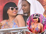 EXCLUSIVE: **MINIMUM FEES APPLY**STRICTLY NO WEB UNTIL 11PM ET FEB 10th 2016** Look away now Rob! Blac Chyna is spotted partying with a mystery man in Trinidad as she wears an extremely revealing Carnival outfit. The hunky man cosied up to the hip hop model, who has been dating troubled Rob Kardashian, as she danced on the stage of an event at the world famous party. Chyna, who is wearing what is rumoured to be an engagement ring from Rob, certainly didn't seem to mind and smiled as he got up close and even put his arm around her. Kardashian has kept a low public profile while battling weight problems in recent months and may well not want to see these pictures. Blac Chyna is in the country with fellow model Amber Rose for the Trinidad Carnival. 

Pictured: Blac Chyna
Ref: SPL1223438  100216   EXCLUSIVE
Picture by: 246PAPS/Splash News

Splash News and Pictures
Los Angeles: 310-821-2666
New York: 212-619-2666
London: 870-934-2666
pho