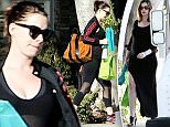 February 10, 2016: Pregnant Anne Hathaway is seen out carrying brightly colored bags and an umbrella while in her workout clothes.  Hathaway and husband Adam Shulman are expecting their first child this Spring, Los Angeles, CA.\nMandatory Credit: Fresh/INFphoto.com Ref.: infusla-284