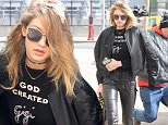 New York, NY - Gigi Hadid shows off her shirt which says "God Created Gigi" while she is out in New York City running errands. Gigi is looking sexy and stylish in a black leather jacket with leather skinny pants, and black leather boots.\nAKM-GSI          February 10, 2016\nTo License These Photos, Please Contact :\nSteve Ginsburg\n(310) 505-8447\n(323) 423-9397\nsteve@akmgsi.com\nsales@akmgsi.com\nor\nMaria Buda\n(917) 242-1505\nmbuda@akmgsi.com\nginsburgspalyinc@gmail.com