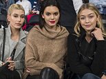 NEW YORK, NY - October 22nd: Reality television Star Kendall Jenner sits court side with  Hailey Baldwin (left) and Gigi Hadid (right) during tonight's game at Madison Square Garden as the New York Knicks vs the Washington Wizards. Wednesday, October 22nd, 2014. (Photo by Anthony Causi)  ....Pictured: Kendall Jenner, Hailey Baldwin, Gigi Hadid..Ref: SPL872116  231014  ..Picture by: Anthony J. Causi / Splash News....Splash News and Pictures..Los Angeles: 310-821-2666..New York: 212-619-2666..London: 870-934-2666..photodesk@splashnews.com..