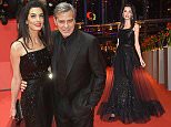 epa05154984 Amal Clooney arrives for the Opening Ceremony of the 66th annual Berlin International Film Festival and the premiere of 'Hail Cesar', in Berlin, Germany, 11 February 2016. The 'Berlinale' runs from 11 to 21 February.  EPA/JENS KALAENE