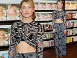 BAL HARBOUR, FL - FEBRUARY 19:  Kate Hudson signs copies of her book "Pretty Happy: Healthy Ways to Love Your Body" at Books and Books on February 19, 2016 in Bal Harbour, Florida.  (Photo by Gustavo Caballero/Getty Images)