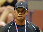 Tiger Woods attends the match between Rafael Nadal of Spain and Fabio Fognini of Italy during their 2015 US Open third round men's singles match at the USTA Billie Jean King National Tennis Center on September 4, 2015  in New York. AFP PHOTO/DON EMMERT        (Photo credit should read DON EMMERT/AFP/Getty Images)