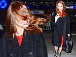 Julianne Moore was spotted arriving to Radio City Music Hall for "Im With Her" a concert benefitting Hillary Clinton's Presidential Campaign. She was a vision in Red as she made her stylish entrance. But a large wind gust sent her hair into a wild mess. She quickly brushed it out of her face, restoring her perfect image.\n\nPictured: Julianne Moore\nRef: SPL1239797  020316  \nPicture by: 247PAPS.TV / Splash News\n\nSplash News and Pictures\nLos Angeles: 310-821-2666\nNew York: 212-619-2666\nLondon: 870-934-2666\nphotodesk@splashnews.com\n