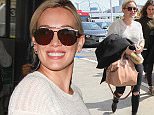Los Angeles, CA - A happy Hilary Duff arrives with a smile for the cameras with a friend at Los Angeles international airport for a flight out of town.
 
AKM-GSI March  1, 2016
To License These Photos, Please Contact :
Steve Ginsburg
(310) 505-8447
(323) 423-9397
steve@akmgsi.com
sales@akmgsi.com
or
Maria Buda
(917) 242-1505
mbuda@akmgsi.com
ginsburgspalyinc@gmail.com