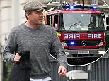 Director Guy Ritchie seen in London the day before his custody battle with Madonna begins in NYC. According to US reports, neither Ritchie or Madonna will attend the hearing on March 2nd.\n\nPictured: Guy Ritchie \nRef: SPL1238196  010316  \nPicture by: JamesJenkins / Splash News\n\nSplash News and Pictures\nLos Angeles: 310-821-2666\nNew York: 212-619-2666\nLondon: 870-934-2666\nphotodesk@splashnews.com\n