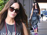 Tuesday, March 1, 2016 - Megan Fox sports rocker chic exercise gear and a fringe black handbag as she leaves SoulCycle in Brentwood, CA. Fox sports a tank top with the text "Good Vibes" on it. Green/X17online.com