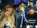 2.March.2016 - Los Angeles ñ USA\n*** STRICTLY AVAILABLE FOR UK AND GERMANY USE ONLY ***\nLos Angeles, CA - Beyonce and Jay Z munch on some Lay's Potato Chips as they sit court side at the Los Angeles Clippers vs. Oklahoma City Thunder game at the Staples Center in Los Angeles, California\nBYLINE MUST READ : AKM-GSI-XPOSURE\n***UK CLIENTS - PICTURES CONTAINING CHILDREN PLEASE PIXELATE FACE PRIOR TO PUBLICATION ***\n*UK CLIENTS MUST CALL PRIOR TO TV OR ONLINE USAGE PLEASE TELEPHONE 0208 344 2007*