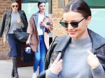 Model Miranda Kerr steps out in a style outfit in New York City, she was wearing a blue skirt with a grey top and leather knee high boots and matching jacket over her shoulders  as carrying her Celine bag\n\nPictured: Miranda Kerr\nRef: SPL1239932  030316  \nPicture by: Felipe Ramales / Splash News\n\nSplash News and Pictures\nLos Angeles: 310-821-2666\nNew York: 212-619-2666\nLondon: 870-934-2666\nphotodesk@splashnews.com\n