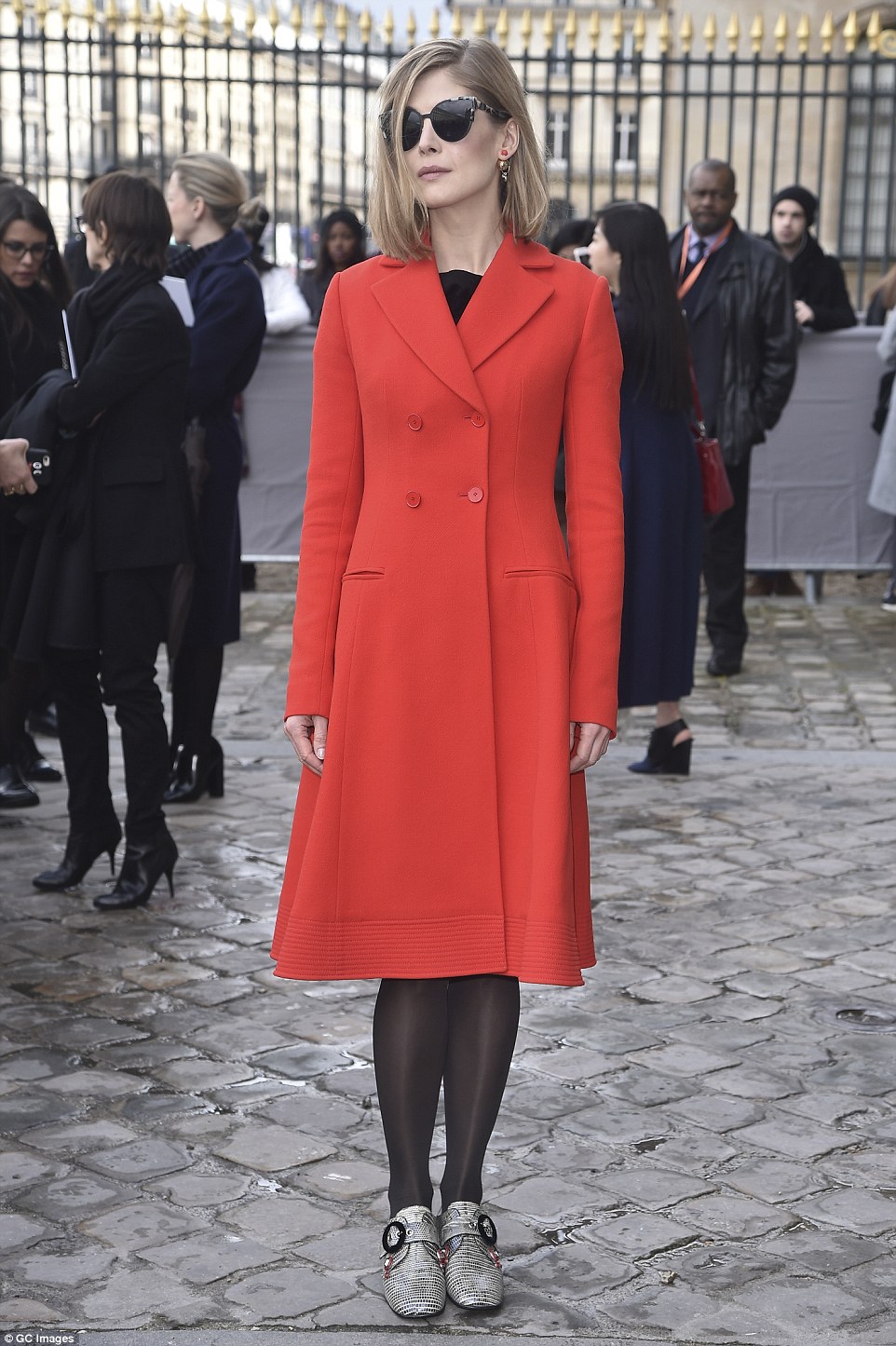 Classic: She channeled Parisian style perfectly in a clean palette of red and black