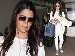 LOS ANGELES, CA, USA - March 04, 2016 : Model Camila Alves seen at LAX Airport on March 04, 2016 in Los Angeles, California, United States. 

Pictured: Camila Alves
Ref: SPL1241234  040316  
Picture by: Splash News

Splash News and Pictures
Los Angeles: 310-821-2666
New York: 212-619-2666
London: 870-934-2666
photodesk@splashnews.com