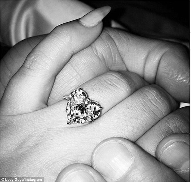 Bling: The Chicago Fire actor presented the Applause hitmaker with a stunning diamond engagement ring last Valentine's Day