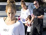 EXCLUSIVE: Jennifer Lopez takes her daughter Emme and boyfriend Casper Smart out for frozen yoghurt.  The trio were spotted in Calabasas on Wednesday afternoon.  J Lo wore a white scoop neck sweater with the slogan "Love your soul and be happy" written on it. \n\nPictured: Jennifer Lopez,Emme Lopez,Casper Smart\nRef: SPL1243752  090316   EXCLUSIVE\nPicture by: Splash News\n\nSplash News and Pictures\nLos Angeles: 310-821-2666\nNew York: 212-619-2666\nLondon: 870-934-2666\nphotodesk@splashnews.com\n