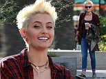 149228, EXCLUSIVE: Paris Jackson sports her new punker bleach blonde hair as she illegally smokes and hangs out with friends in Malibu. The 17 year old daughter of Michael Jackson drastically changed her look by chopping off her long dark locks, dying it first a strawberry blonde before the bleach blonde. Photograph: © PacificCoastNews. Los Angeles Office: +1 310.822.0419 sales@pacificcoastnews.com FEE MUST BE AGREED PRIOR TO USAGE