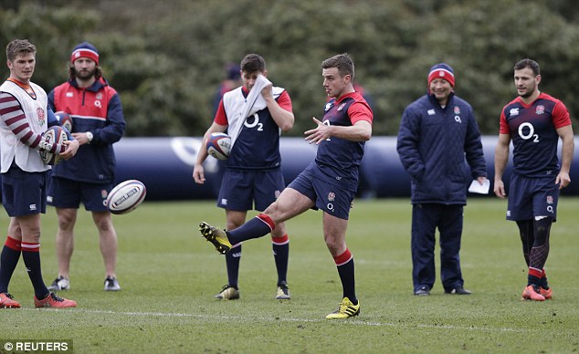 England fly-half George Ford works on his kicking from hand during the training session at Pennyhill Park