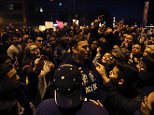 Mandatory Credit: Photo by Chris Sweda/Chicago Tribune/REX/Shutterstock (5612885n)
Trump supporters and protesters clash outside the UIC Pavilion after the cancelled rally for the Republican presidential candidate in Chicago
Donald Trump presidential campaigning, Chicago, America - 11 Mar 2016