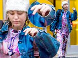 EXCLUSIVE: Miley Cyrus was seen leaving her New York apartment wearing a sweat suit with graphic manga characters on it, about which she proudly instargamed before. \n\nPictured: Miley Cyrus\nRef: SPL1243328  140316   EXCLUSIVE\nPicture by: Splash News\n\nSplash News and Pictures\nLos Angeles: 310-821-2666\nNew York: 212-619-2666\nLondon: 870-934-2666\nphotodesk@splashnews.com\n