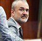 Gawker Media founder Nick Denton, left, and reporter A.J. Daulerio, right, sit inside a Pinellas County courtroom, Monday, March 14, 2016, in St Petersburg, Fla. Hulk Hogan, whose real name is Terry Bollea, is suing Gawker Media for the publication of a sex tape involving the former wrestler. Lawyers for Gawker Media began presenting their client's case on Monday. (Stephen Yang/New York Post via AP, Pool)