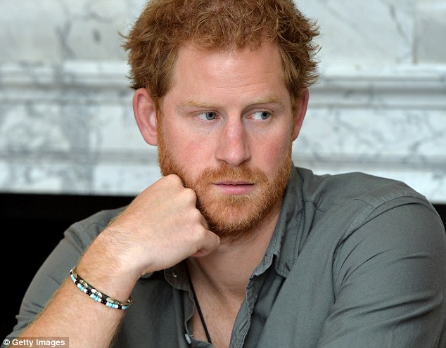 Prince Harry listened intently as the volunteers explained the circumstances in Nepal following last year's devastating earthquake