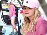 EXCLUSIVE: Chloe Grace Moretz wears no make up and short shorts as she heads to a dermatologist in Beverly Hills. Emma wore a pink sweater and cap as she made her way into a skin doctor. Emma's phone had a small Hilary Clinton sticker on it\n\nPictured: Chloe Grace Moretz\nRef: SPL1247192  150316   EXCLUSIVE\nPicture by: Fern / Bruja / Splash News\n\nSplash News and Pictures\nLos Angeles: 310-821-2666\nNew York: 212-619-2666\nLondon: 870-934-2666\nphotodesk@splashnews.com\n